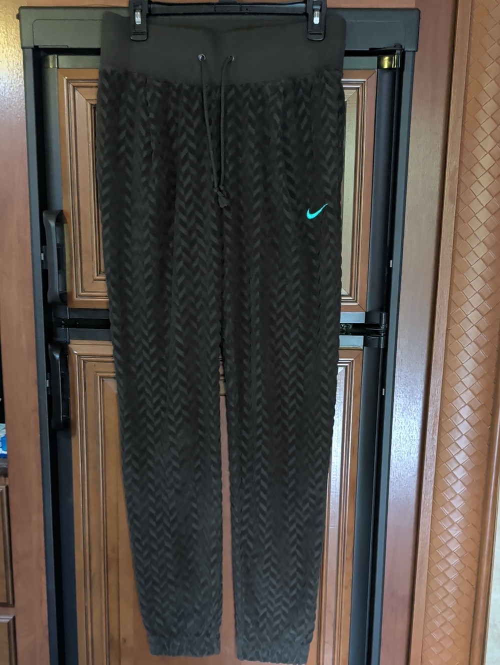 Nike Dark Green Chevron-Textured Track Joggers with Teal Swoosh